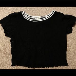 Black crop top with, white and black ring